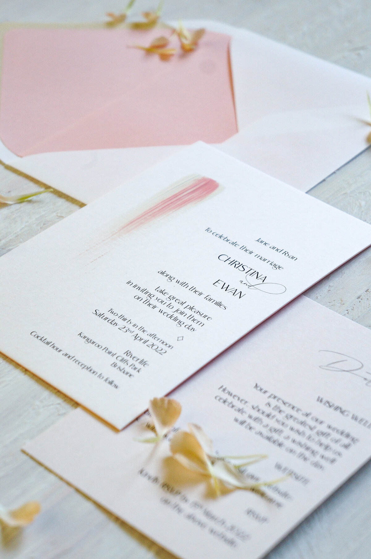 Fine art pink wedding invitation with pink and white painted strip