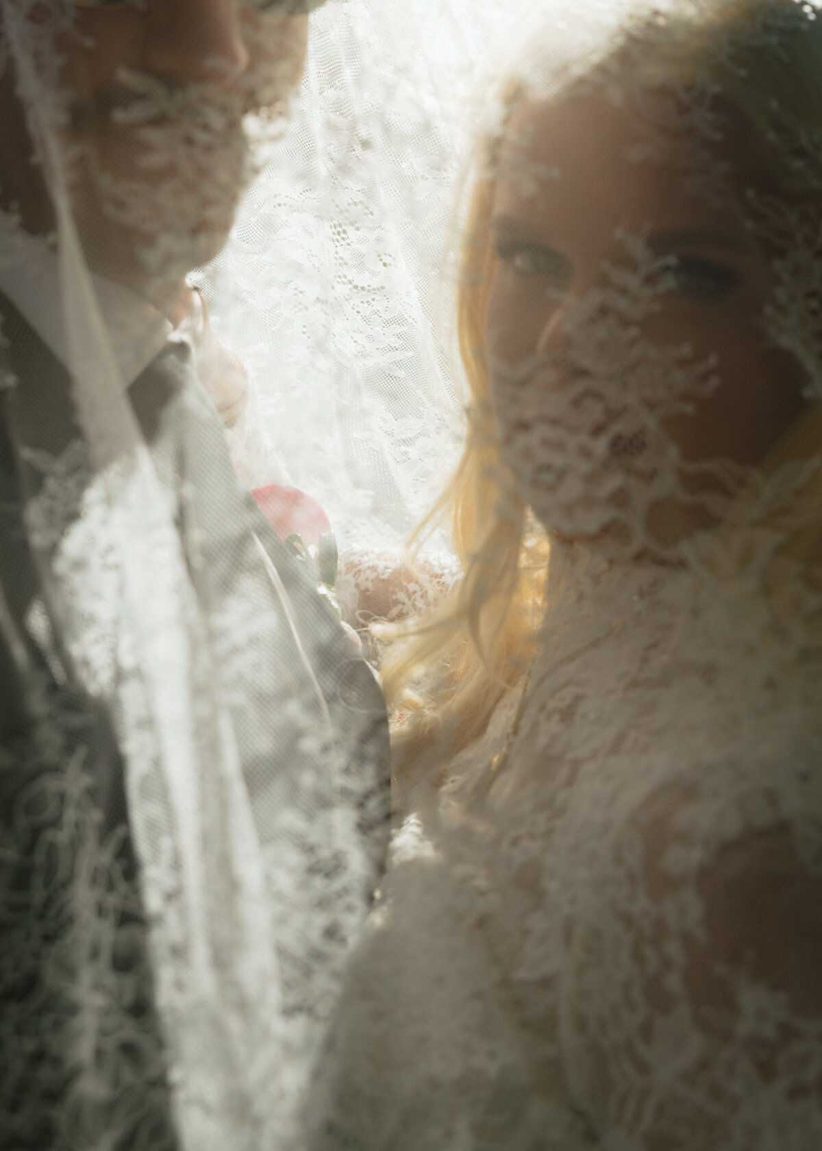 From the ceremony to the last bit of evening light, the bride and groom wanted artistic photographs under her custom veil.