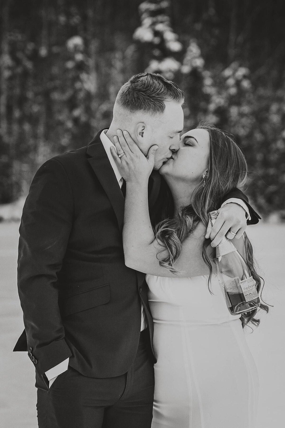 A couple embraces after enjoying some bubbly
