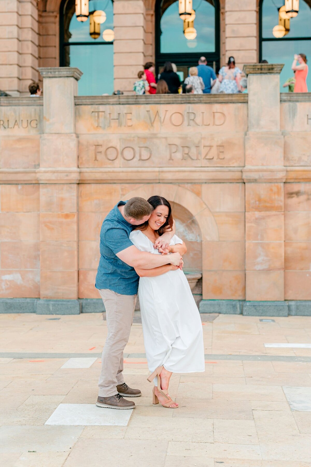 couple-hugging-engagement-airy-colors