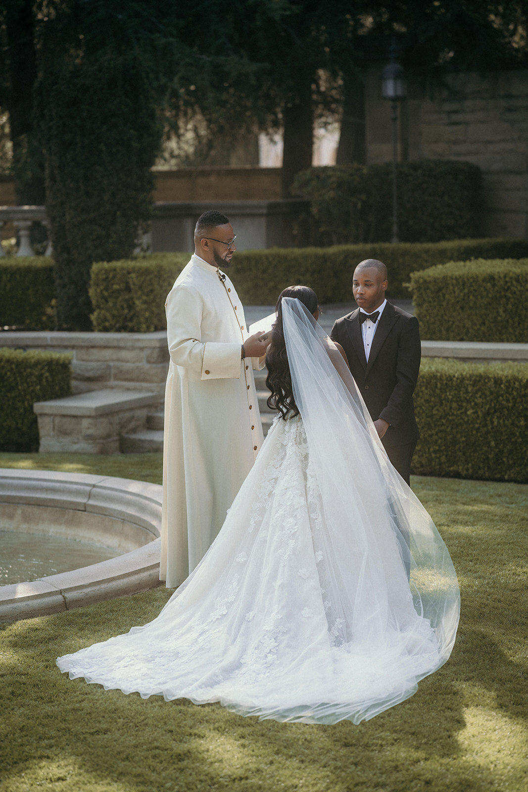 Wedding ceremony in the garden at Greystone Mansion, L.A., California.