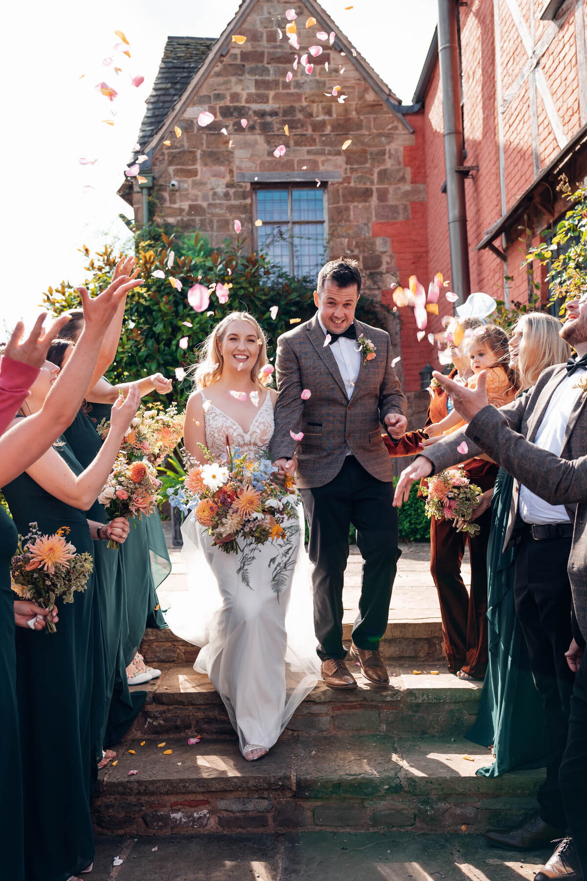 cheltenham-wedding-photographer-confetti-exit