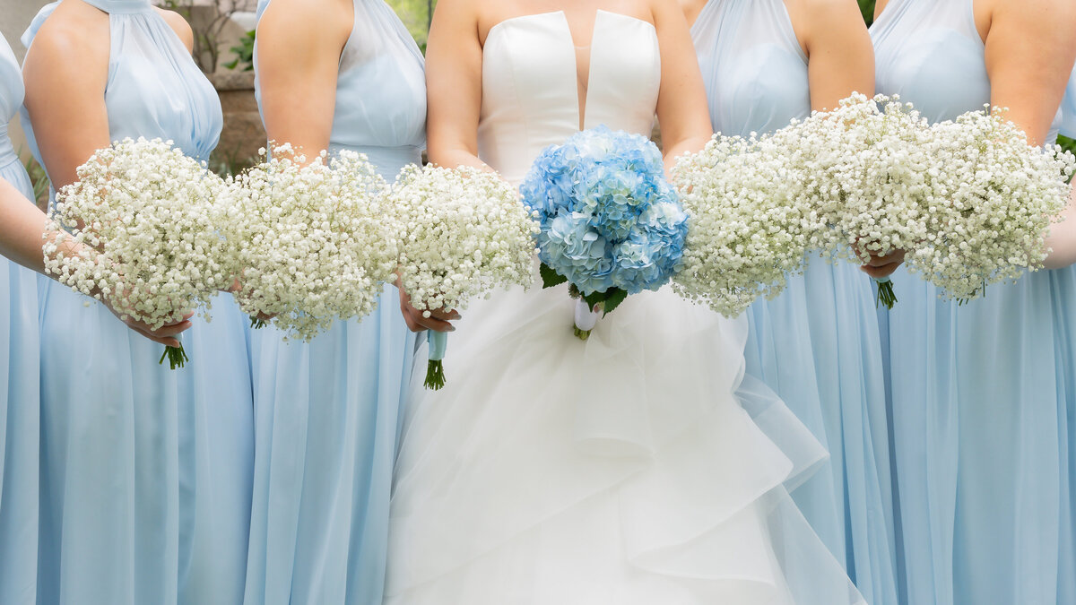 Bride and bridesmaids with bouquets