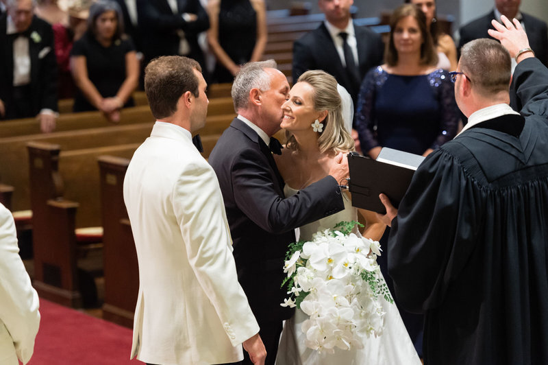 father-giving-bride-kiss-national-city-chrisitian-church-dc