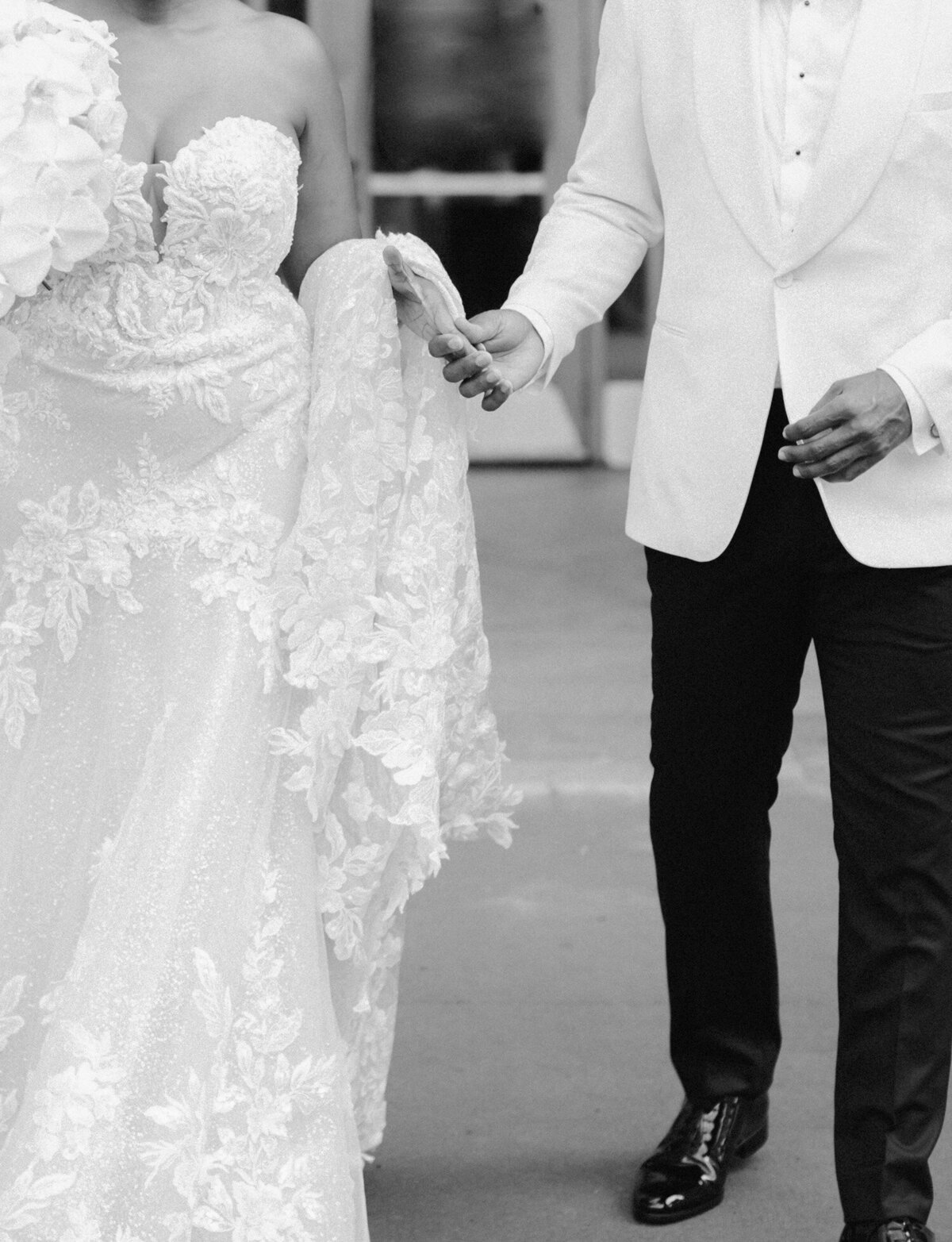 detail of wedding couple holding hands in Detroit, Michigan