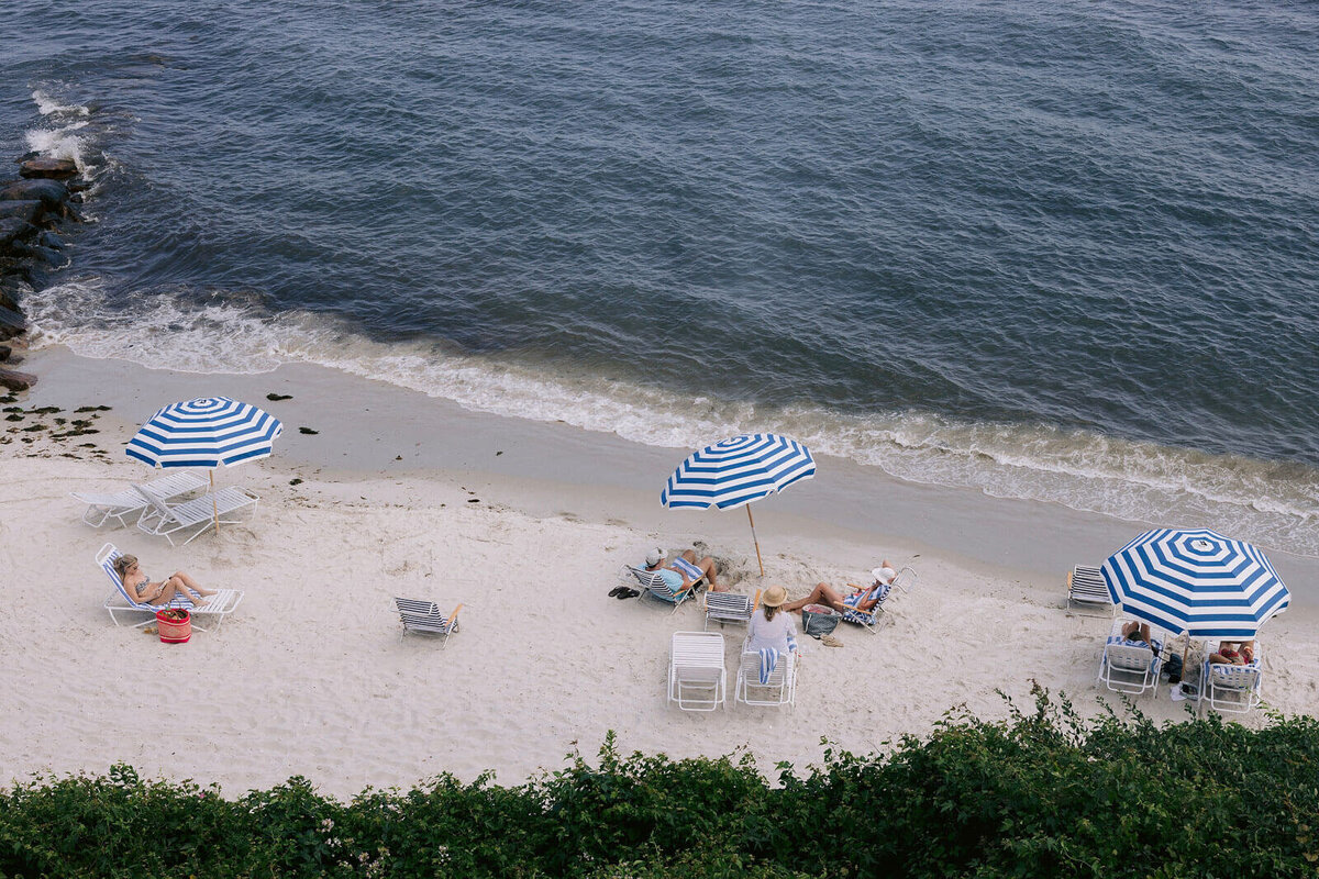 Top view of the beach with a few people sun-bathing in Wianno Club, Cape Cod, MA.