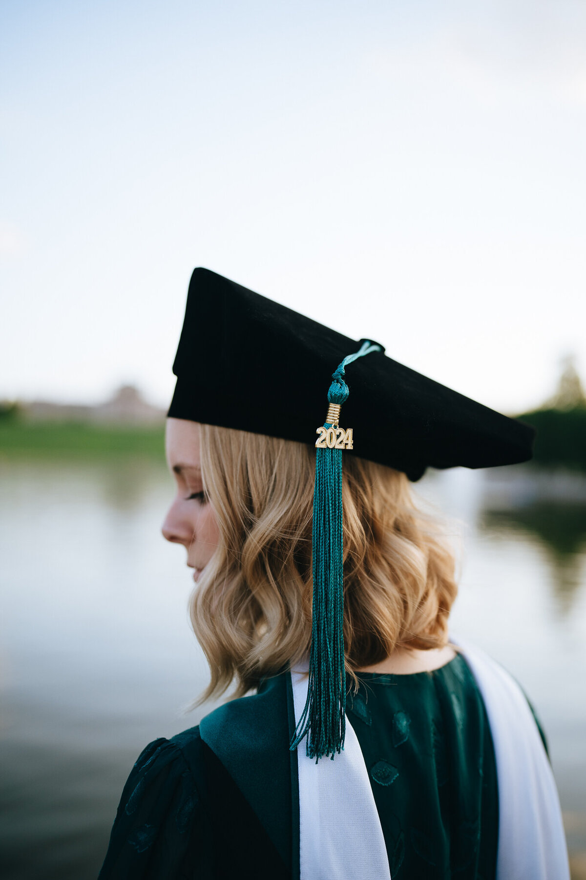 close up photo of washu grad wearing graduation cap
