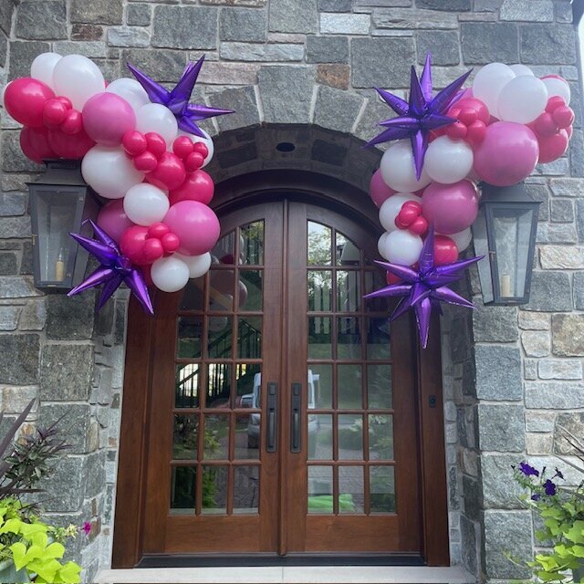 hot pink purple white balloon installation