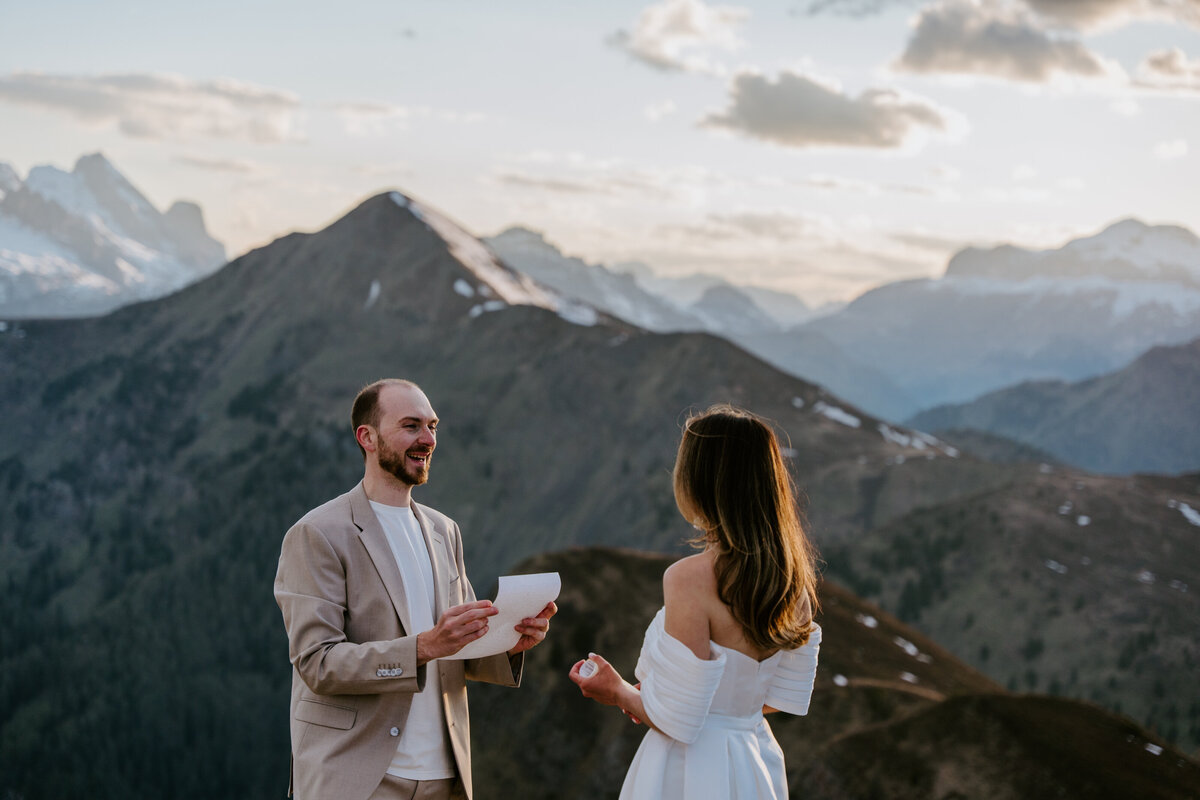happy couple together in mountain elopement in Dolomites