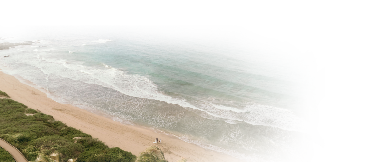 Maui Elopement Photographer captures beach waves during small beach wedding