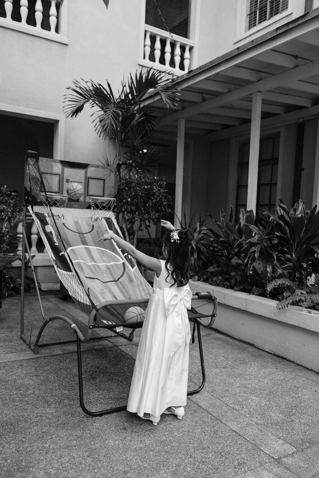 Little girl playing basketball at upscale cafe julia wedding