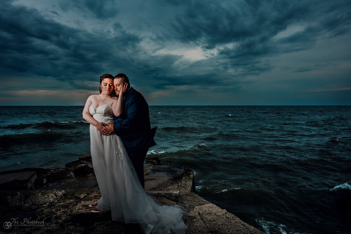 TP6_5142-Lake Erie-Wedding-storm clouds-water-bride-groom