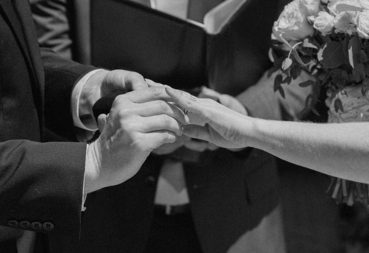 The moment of the rings during ceremony for a green bay wedding