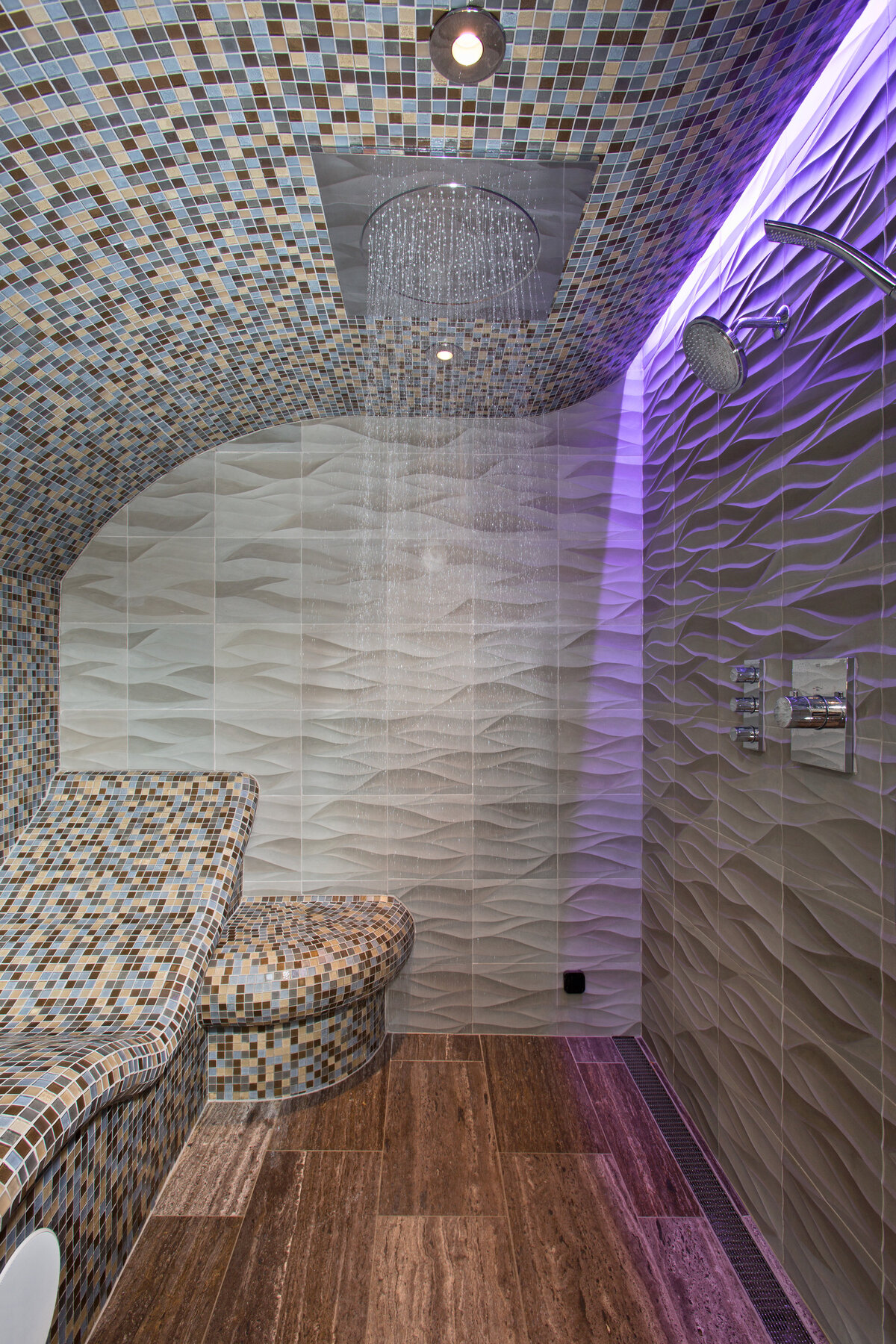 shower rain room with light tile