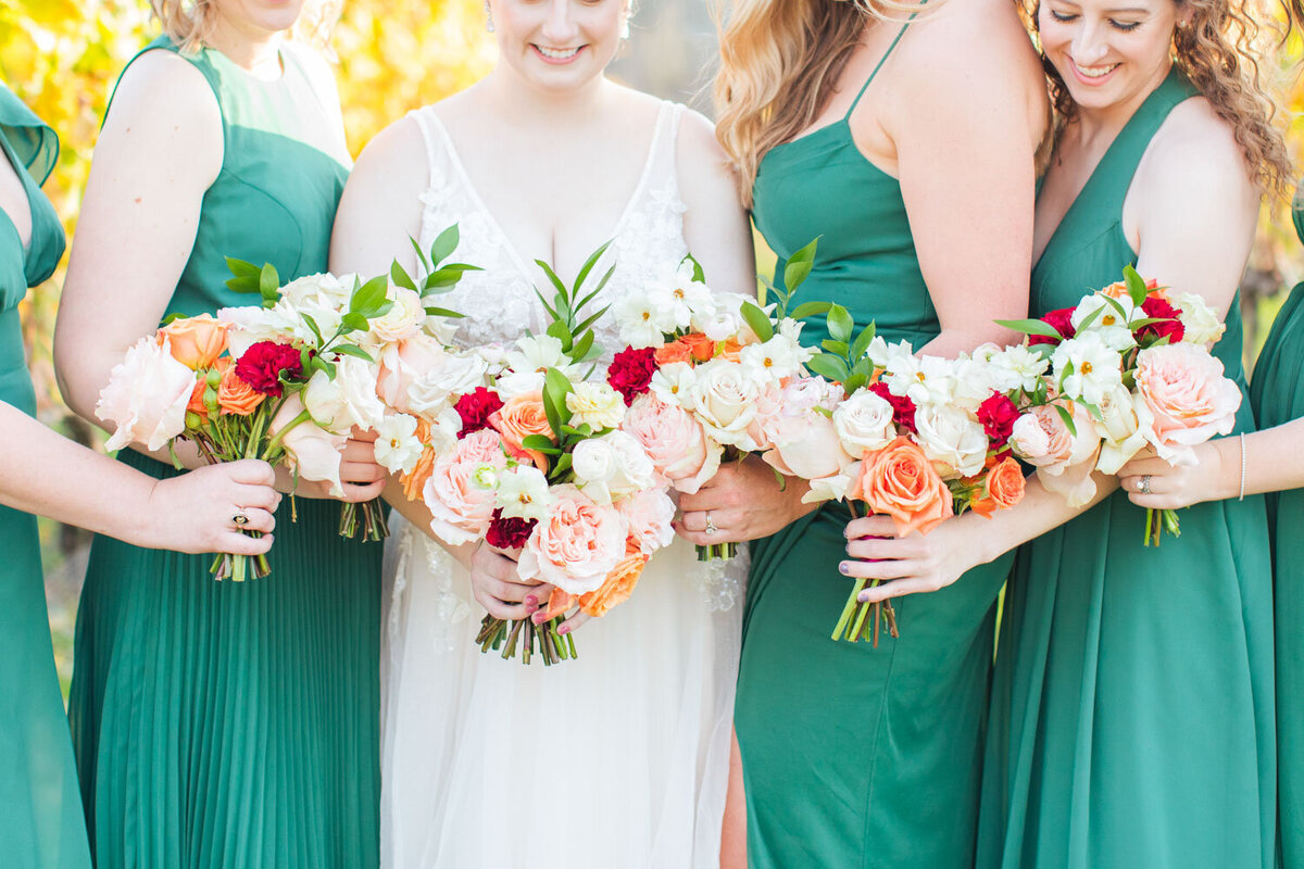 Bride and bridesmaids holding their bouquet