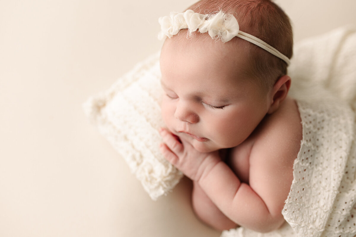 Newborn side profile photo 