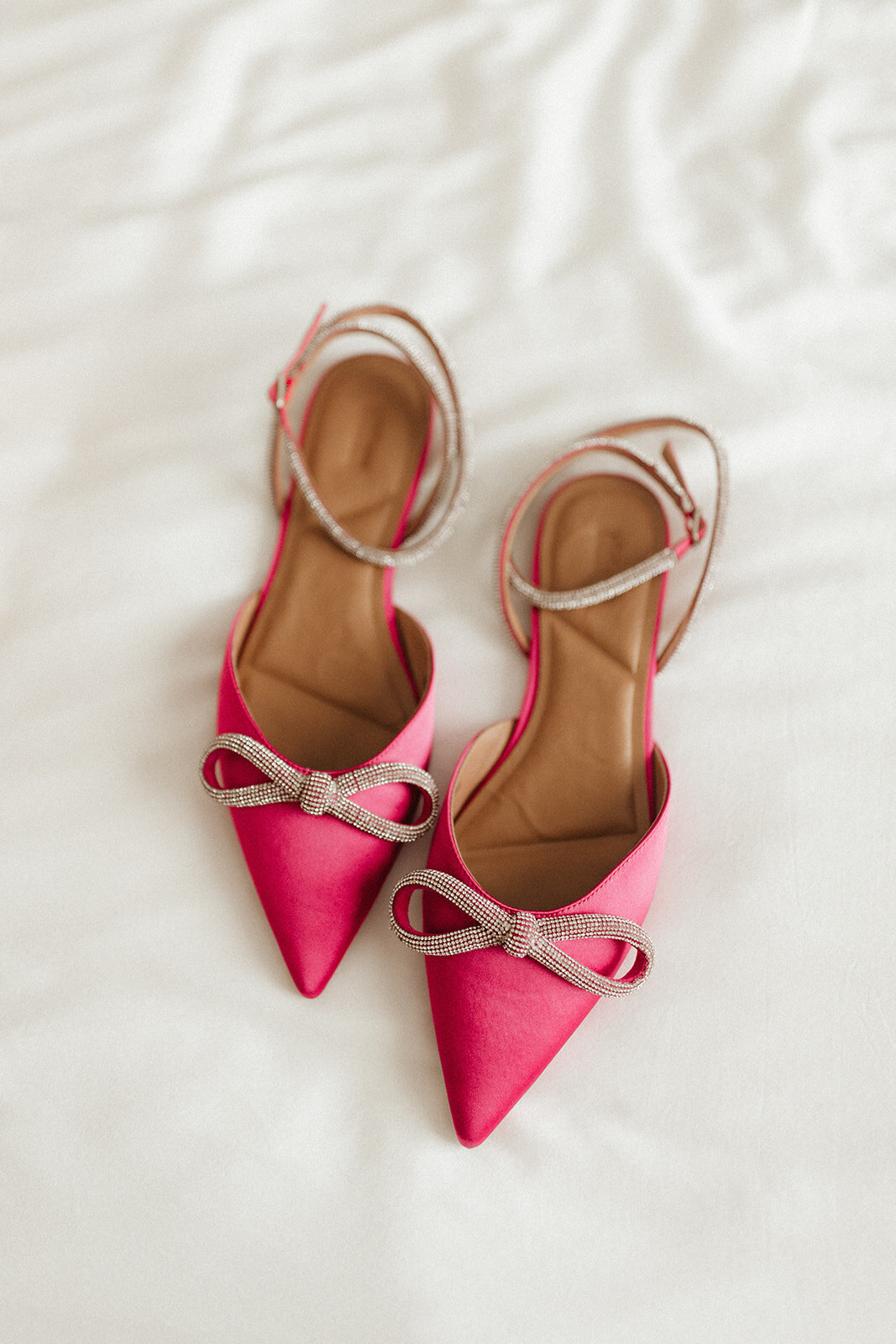 Photo of hot pink heels on white background