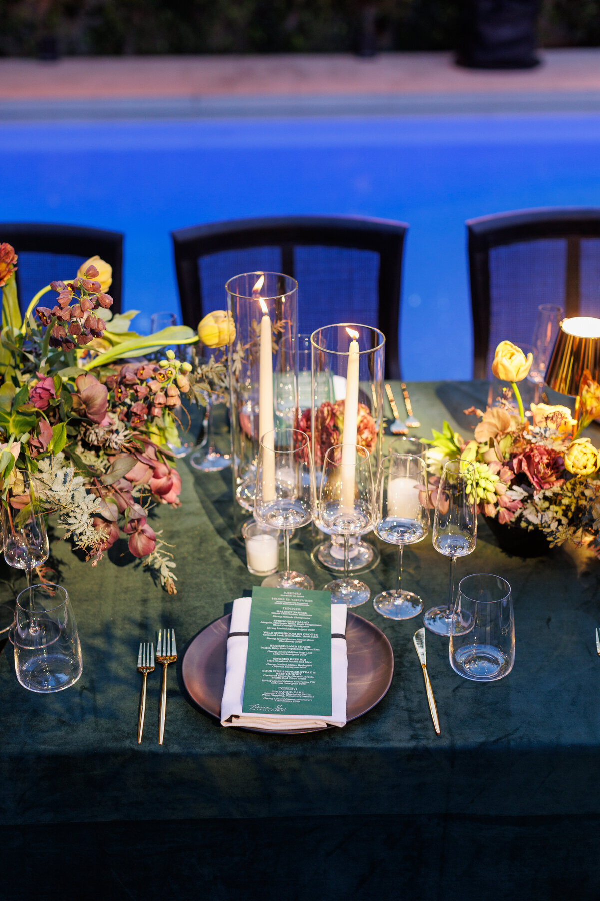 candles, flowers and a menu