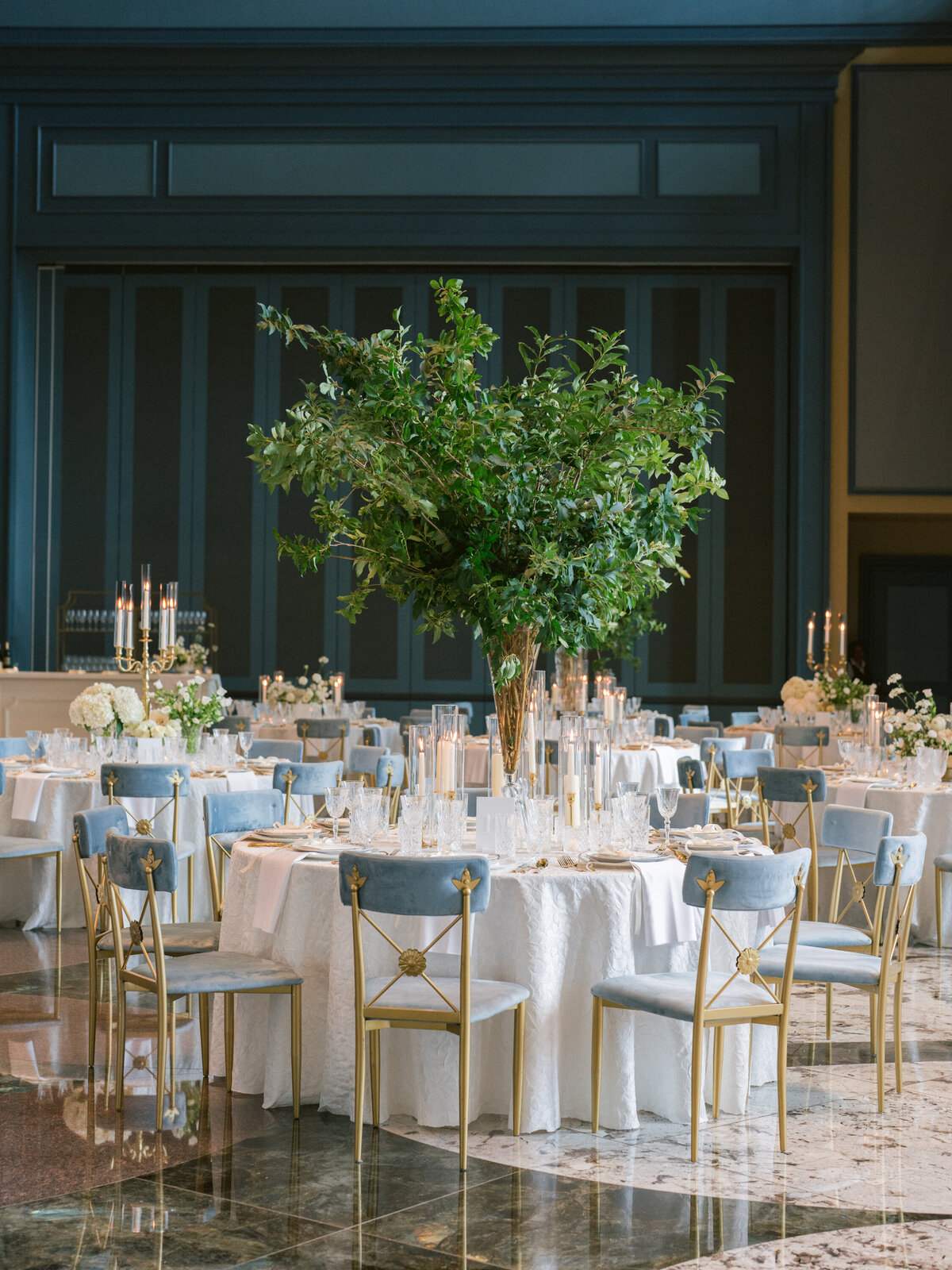Tree centerpiece at upscale wedding reception