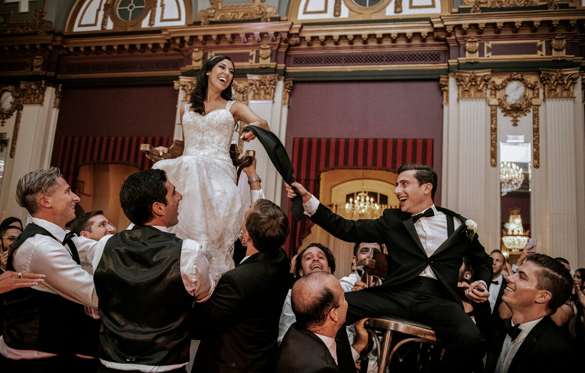 hora-dance-with-elevated-chairs