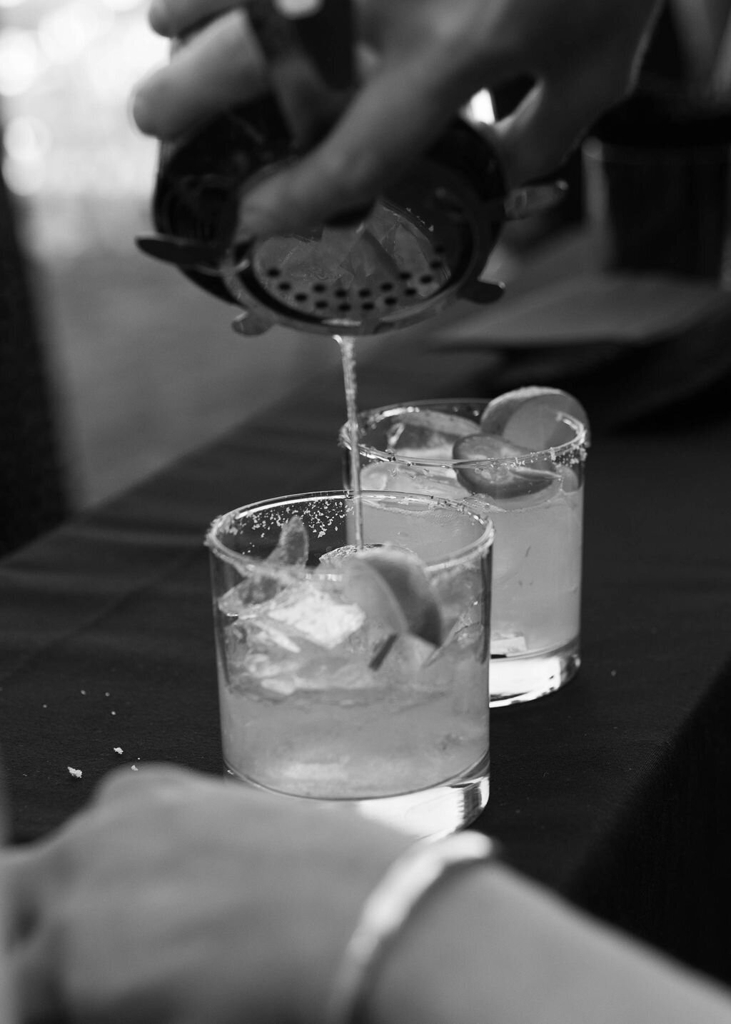 pouring-signature-cocktails-wedding-reception