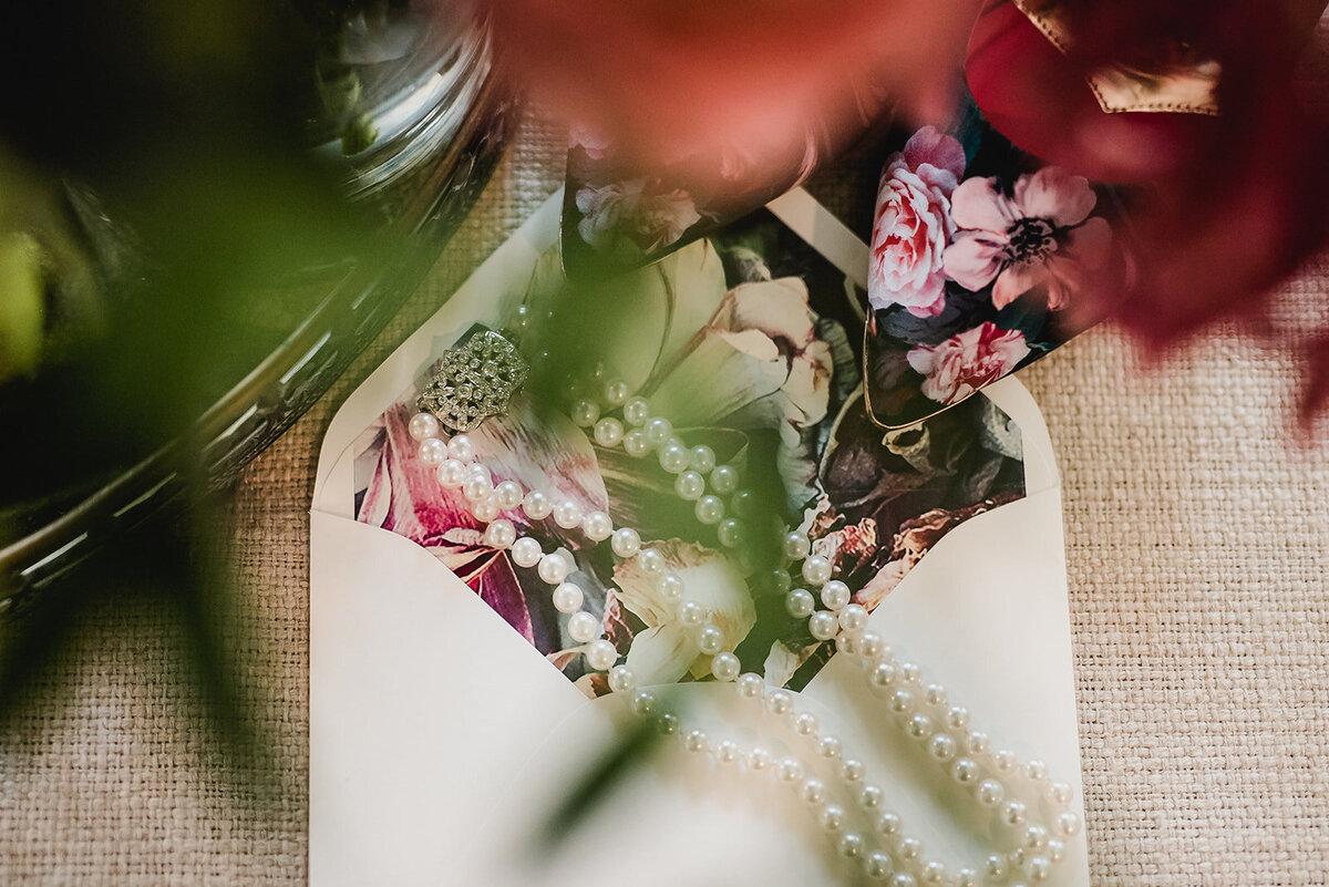 An elegant black tie garden wedding at Planterra Conservatory in West Bloomfield Michigan provided by top rated Metro Detroit wedding photographer Kari Dawson