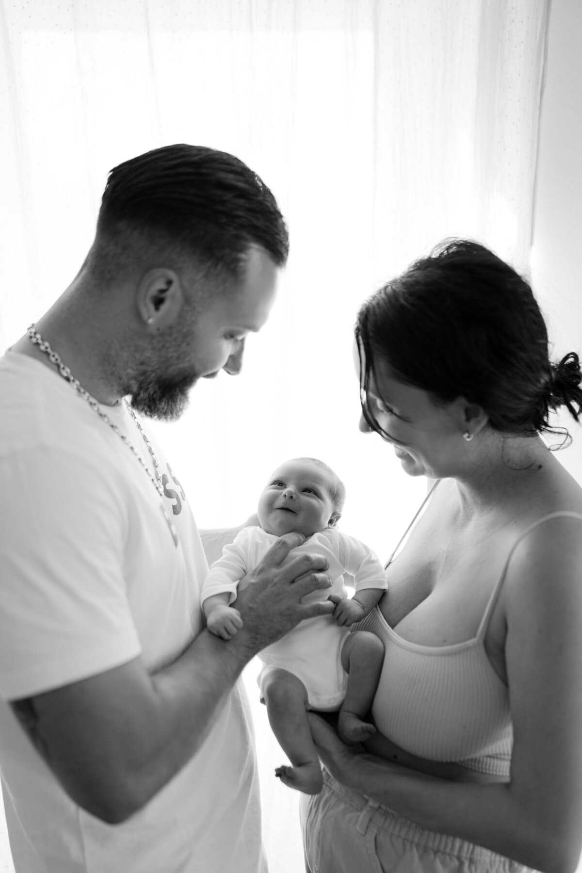 Photographe famille à Valais lors d'une séance  À domicile