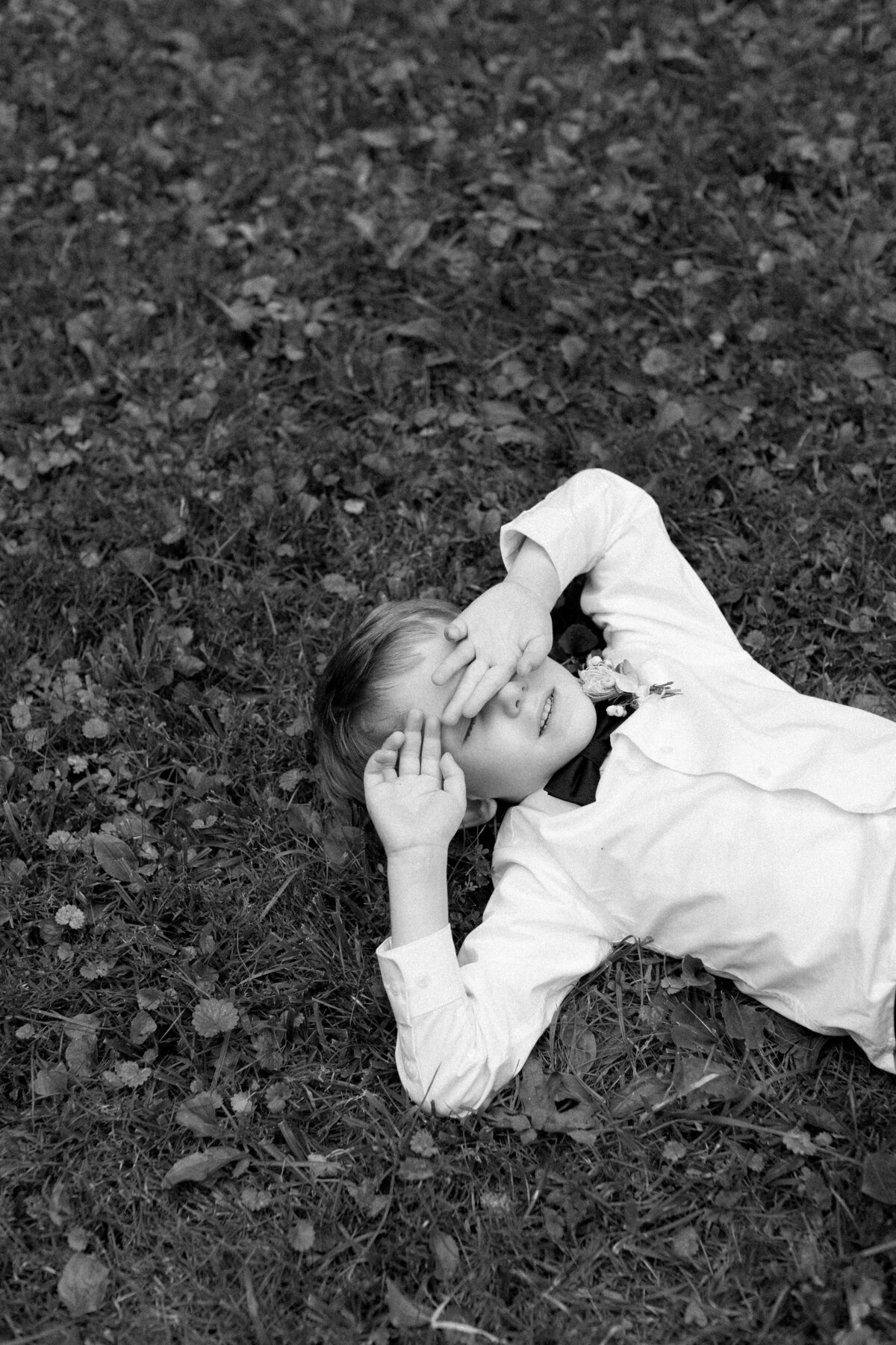 boy-laying-in-grass