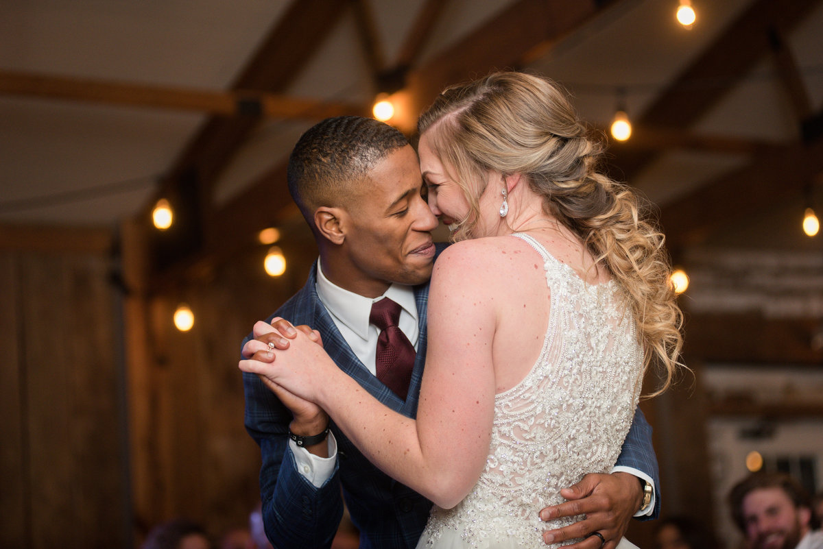 groom dancing with bride at vineyard estate at new kent winery wedding by va wedding photographer