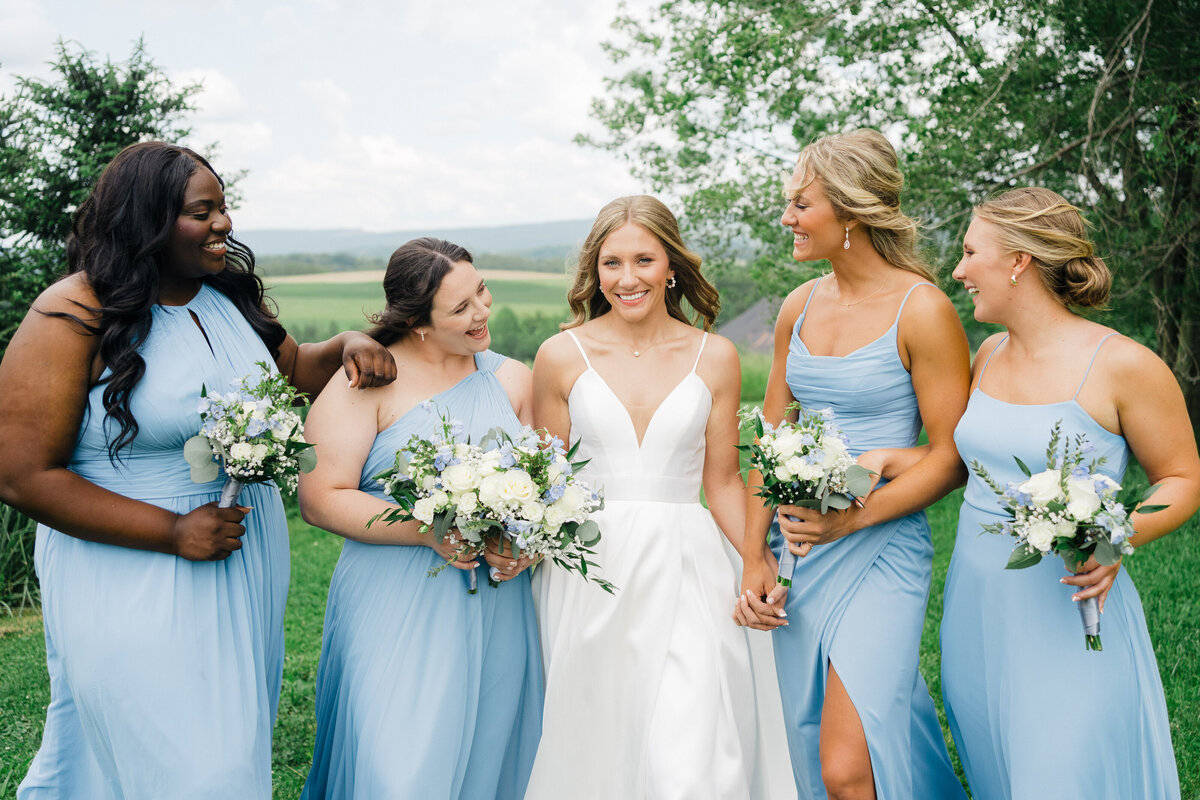 bridesmaids-having-fun-company-stables"