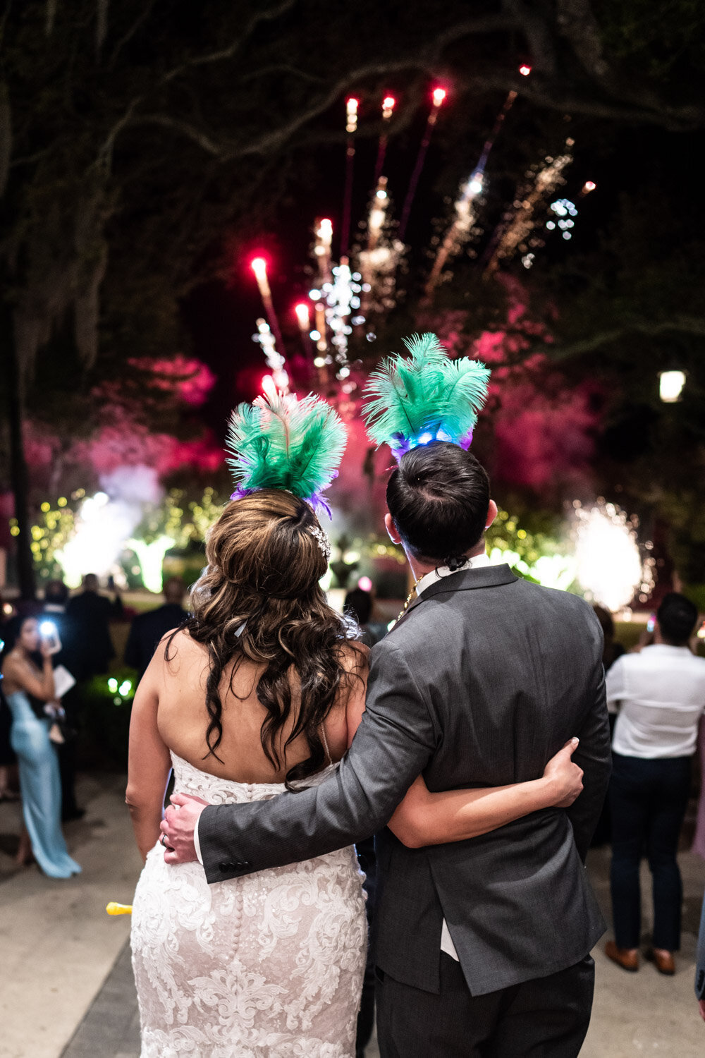 Bride and groom watching send-off fireworks show at Southern Oaks