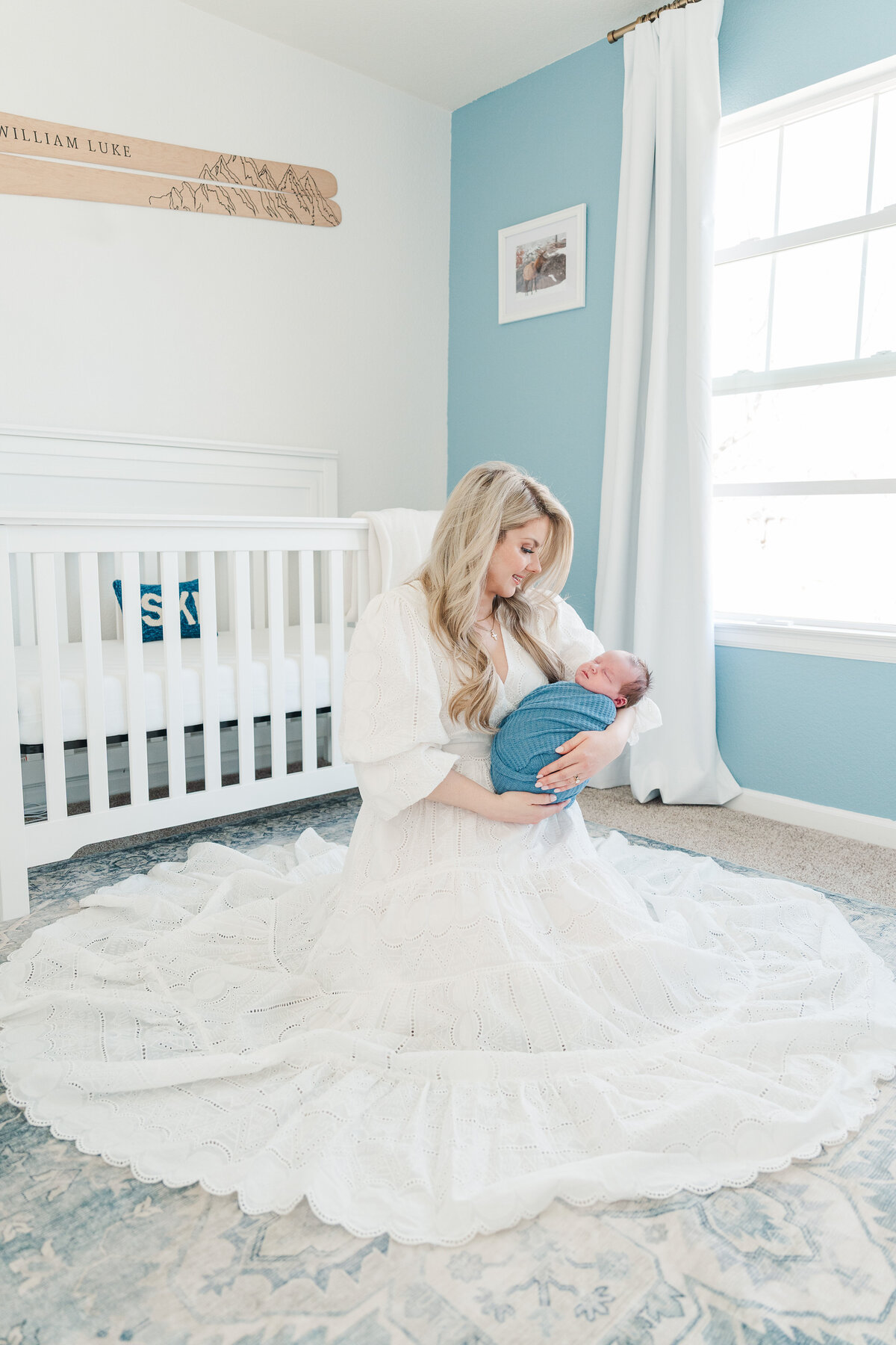 Light and neutral baby boy in home lifestyle newborn photos colorado elena spraguer photography 0033