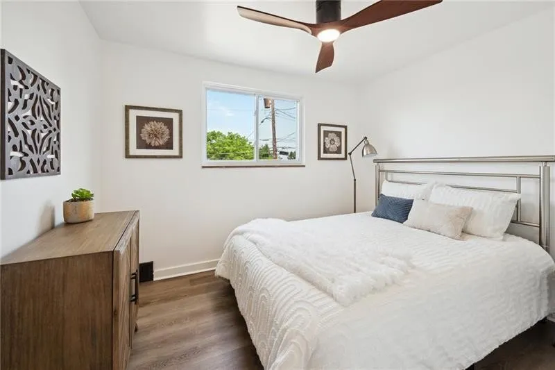 Bright and inviting staged bedroom showcasing functional design for quick home sale