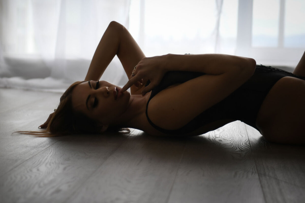 woman on floor in vancouver boudoir studio