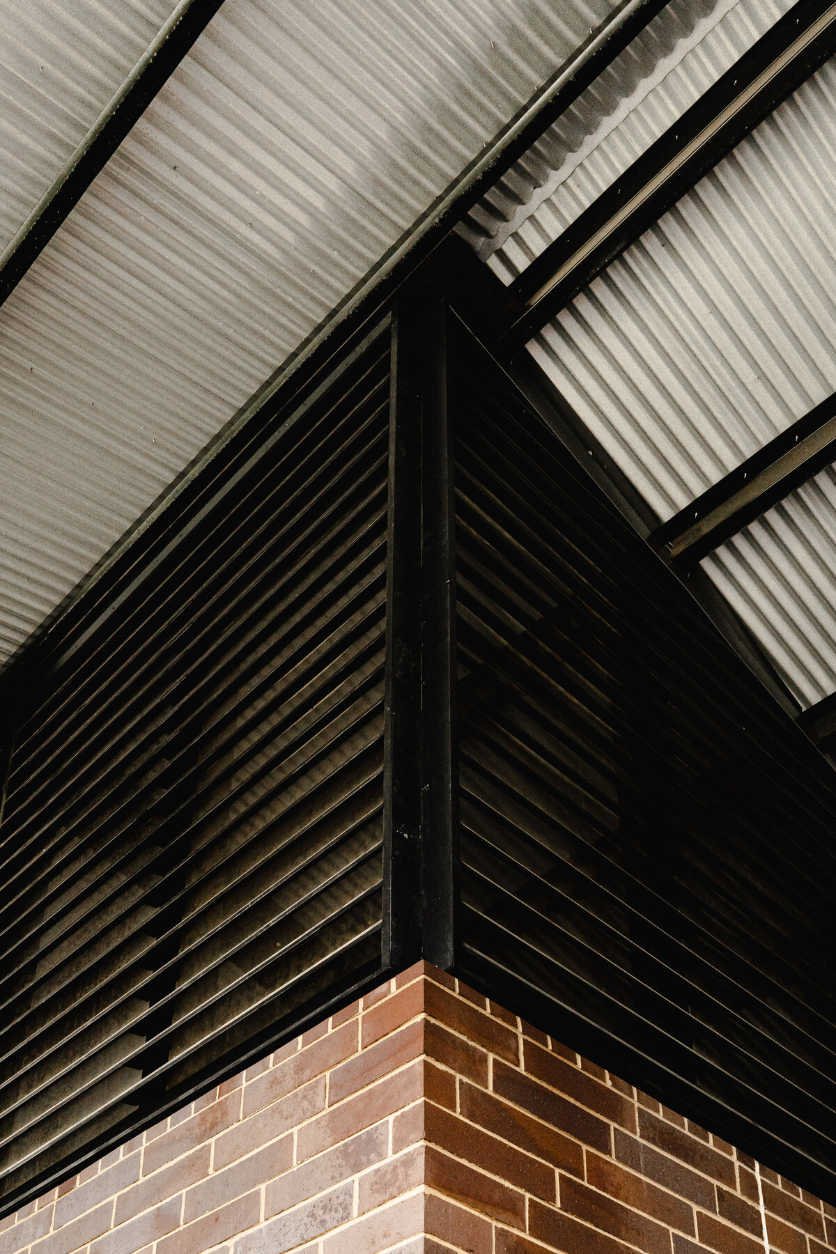 corner detail of building meeting roof