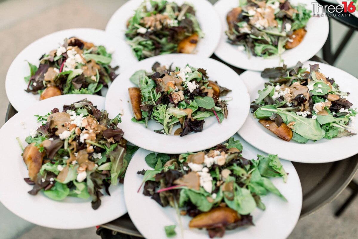 Dinner salads stacked and ready to be served at the Coto de Caza Golf & Racquet Club wedding venue