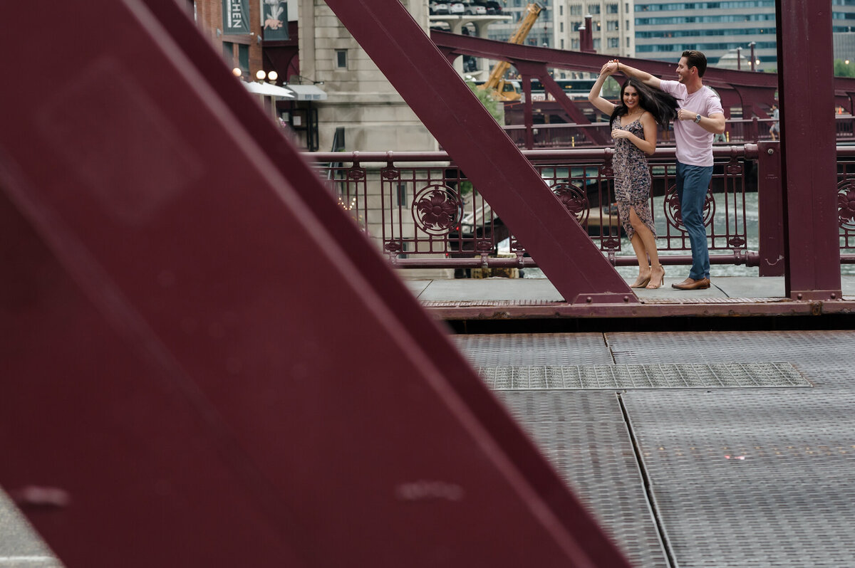 A couple dances on LaSalle Bridge in Chicago, Illinois