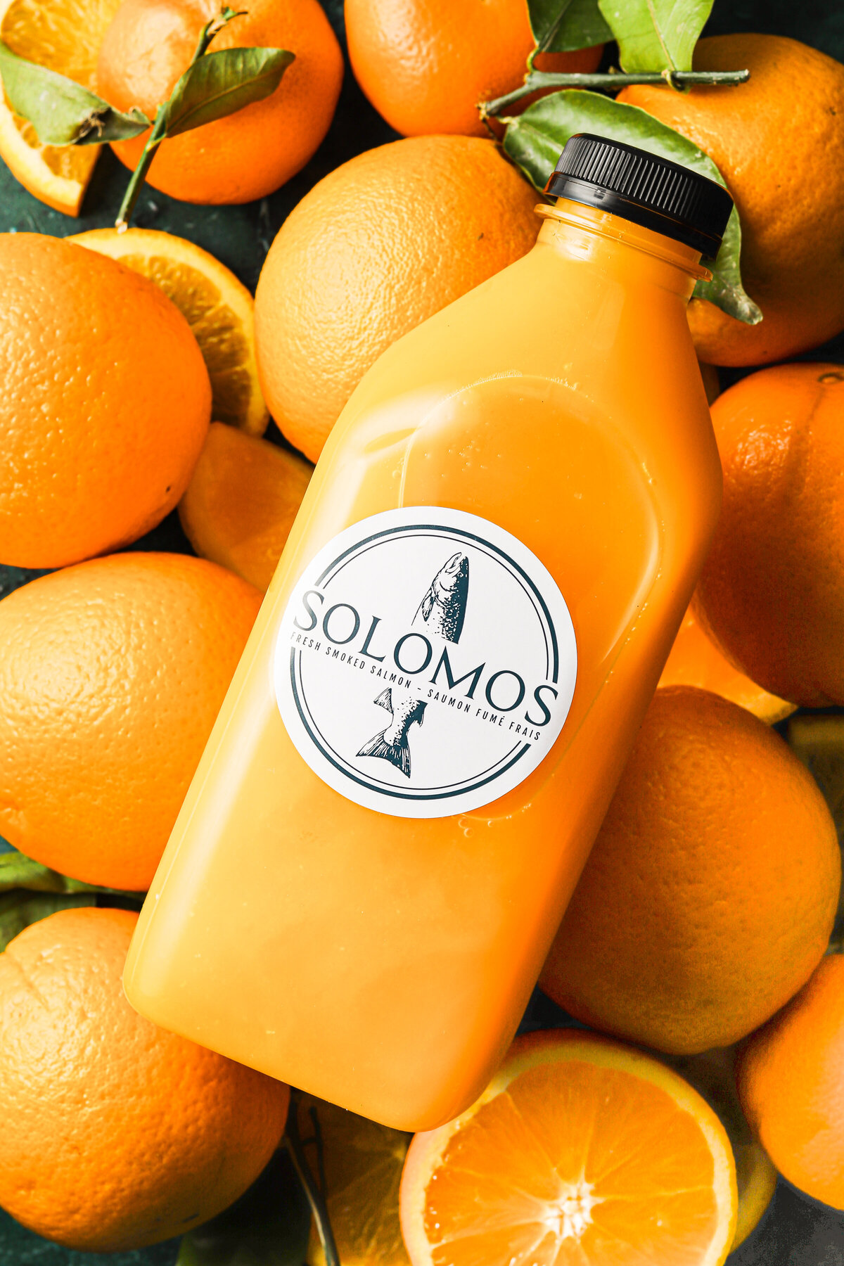 orange juice in a plastic bottle with a Solomos sticker on it
