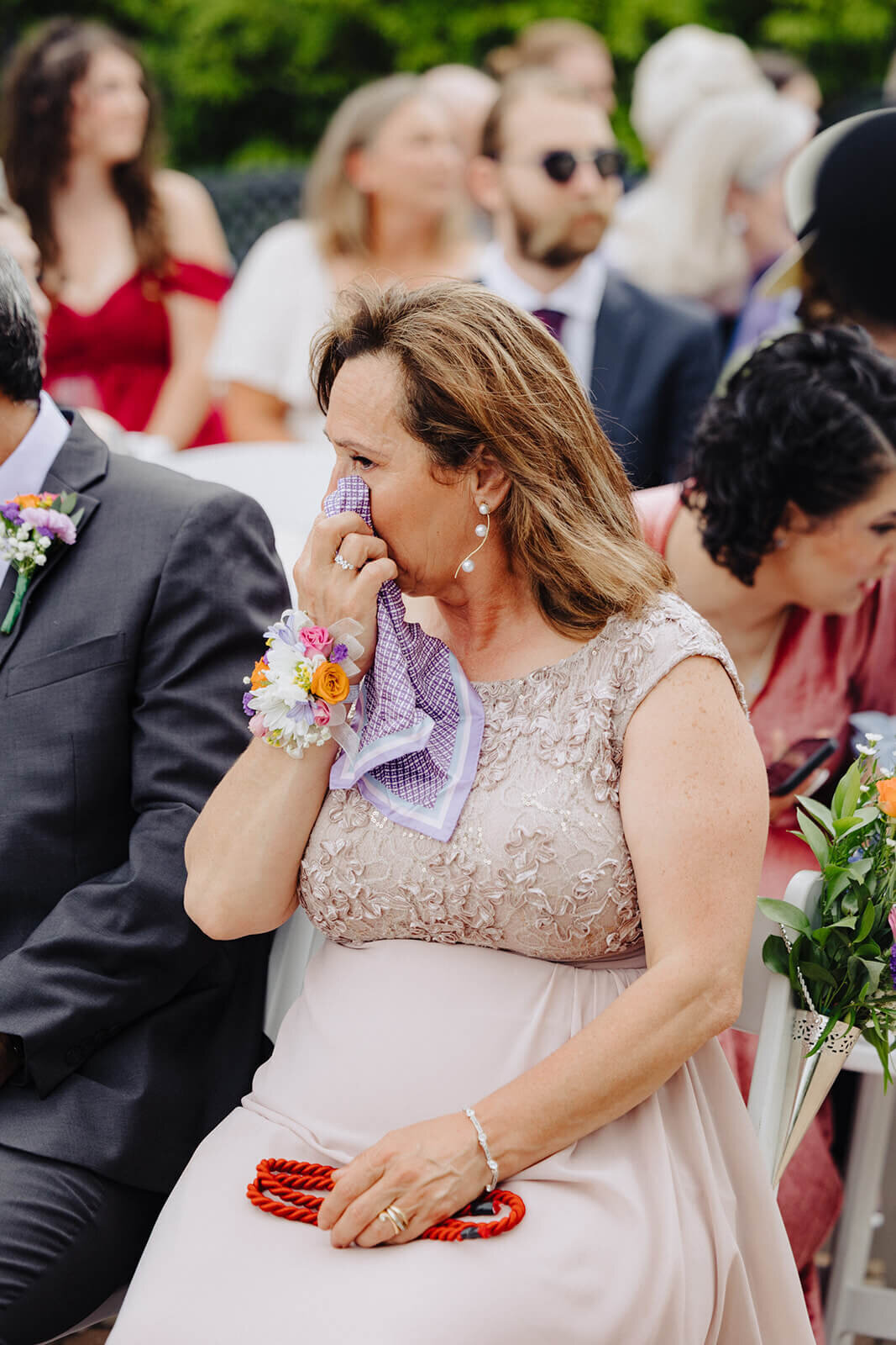 Guest looking emotional at wedding at The Mansion at Keuka Lake, NY