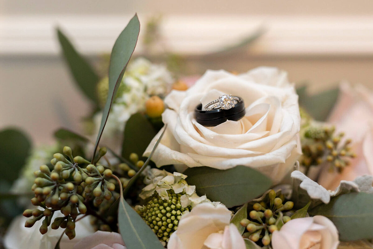 wedding ring in peach flowers