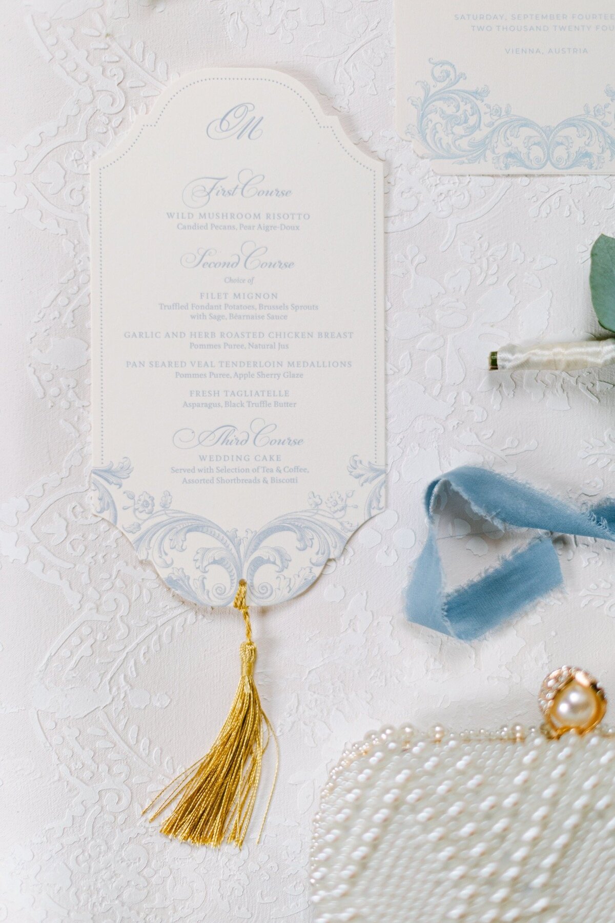 Elegant destination wedding menu card at the luxury palace Coburg in Vienna planned by ECLAT Destination Weddings