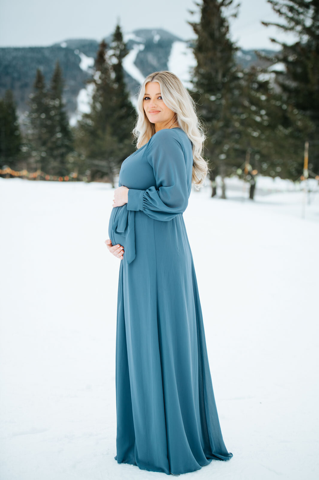 pregnant maternity woman in blue dress at killington mountain