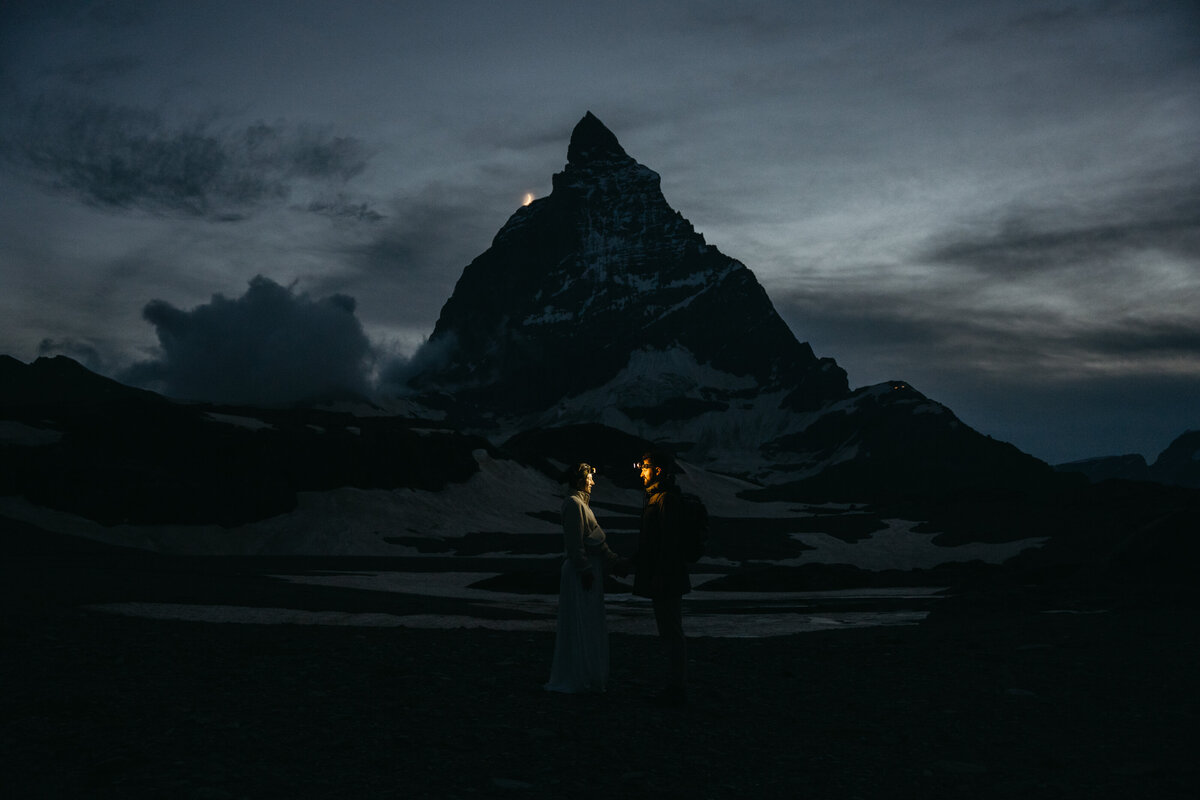 Couple eloping at Lago di Braies in Italy