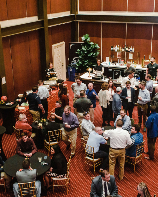 people mingling at a corporate event