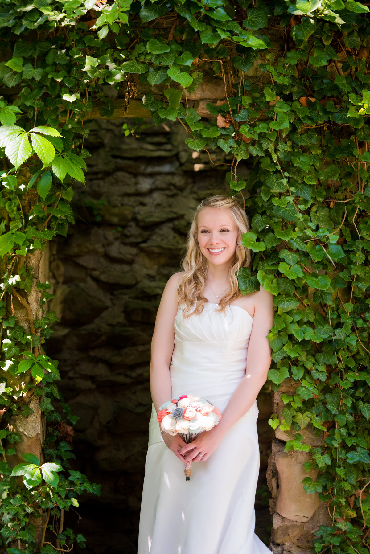 bride posing for a photo at the Hyeholde restaurant ivy