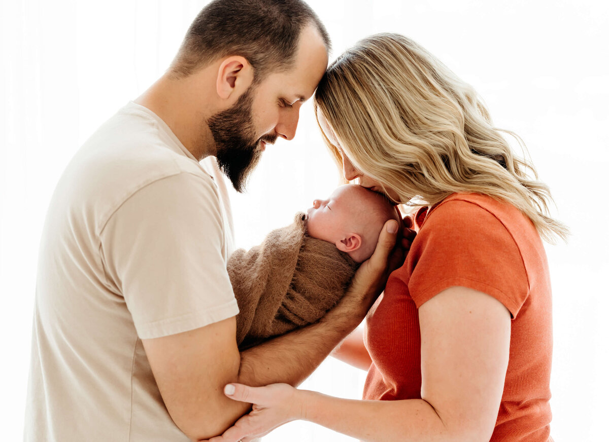 both-parents-with-baby-studio