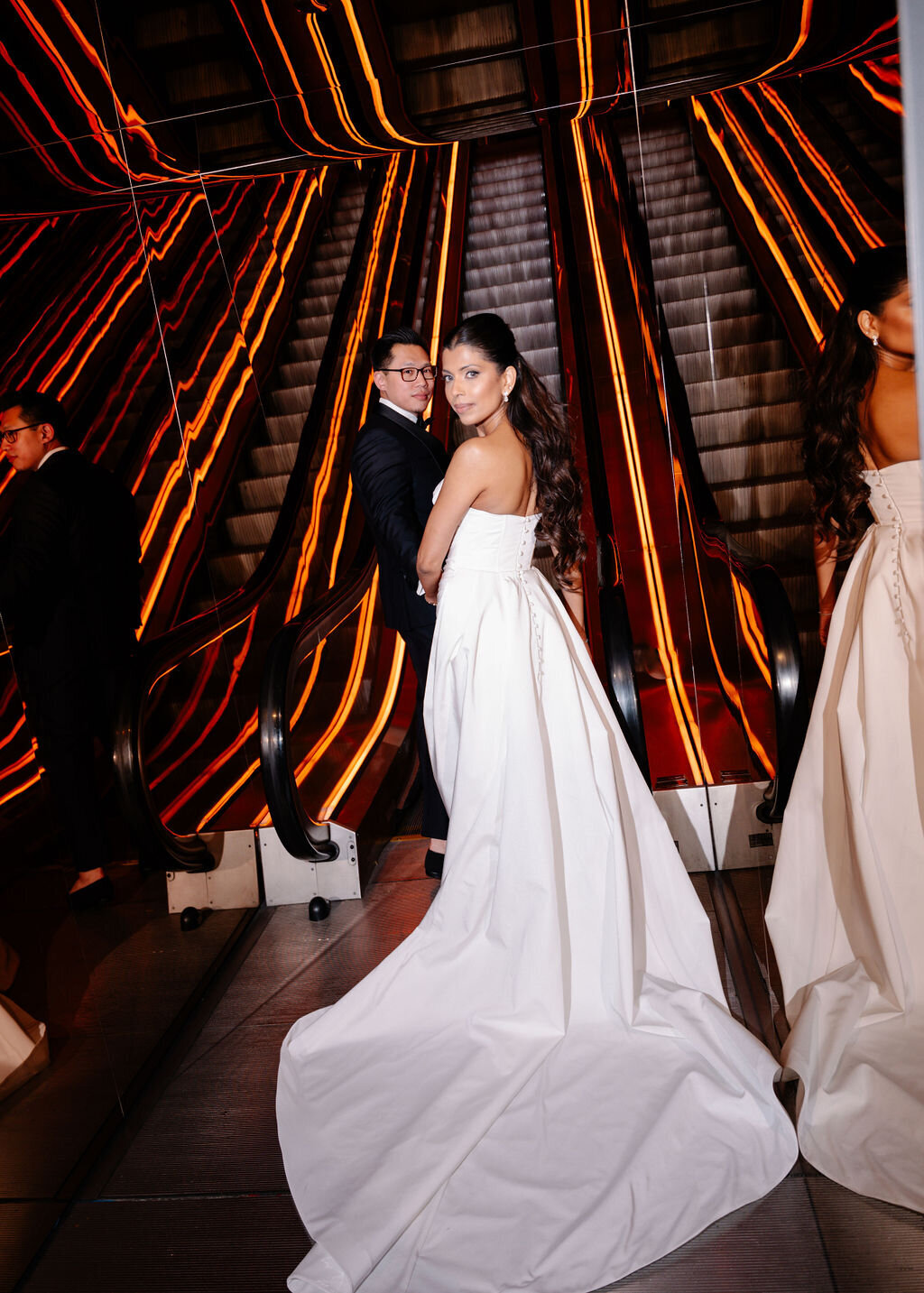 Bride and groom portrait on escalator at Public Hotel NYC