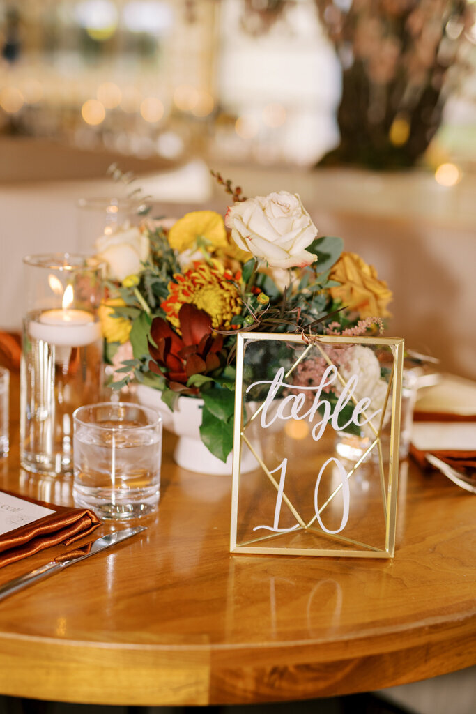 Colourful yellow, pink and white wedding reception decor designed by More Events Co, featured on the Brontë Bride Vendor Guide.