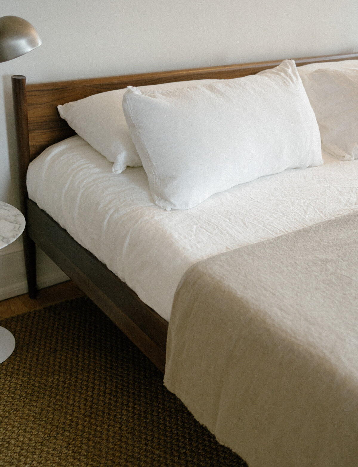 crisp, soft linens on bed at ALEO Detroit, Little Village bed and breakfast