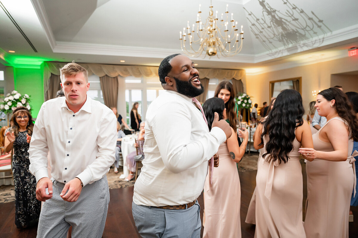 friend dancing on the reception floor at southpointe wedding